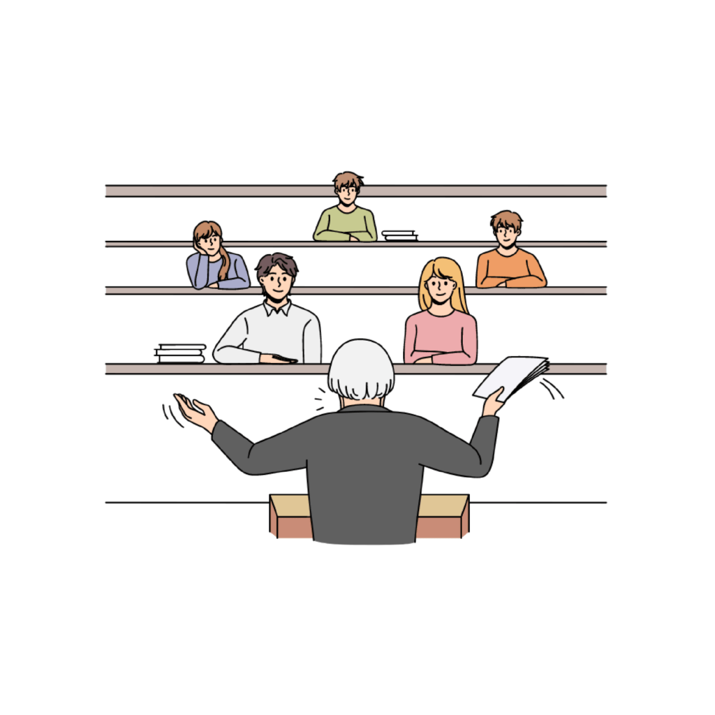 An instructor stands in front of a lecture hall, addressing a diverse group of students seated on tiered levels, some with books on their desks.